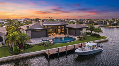 Modern Naples waterfront home at sunset where a home watch walkthrough would take place